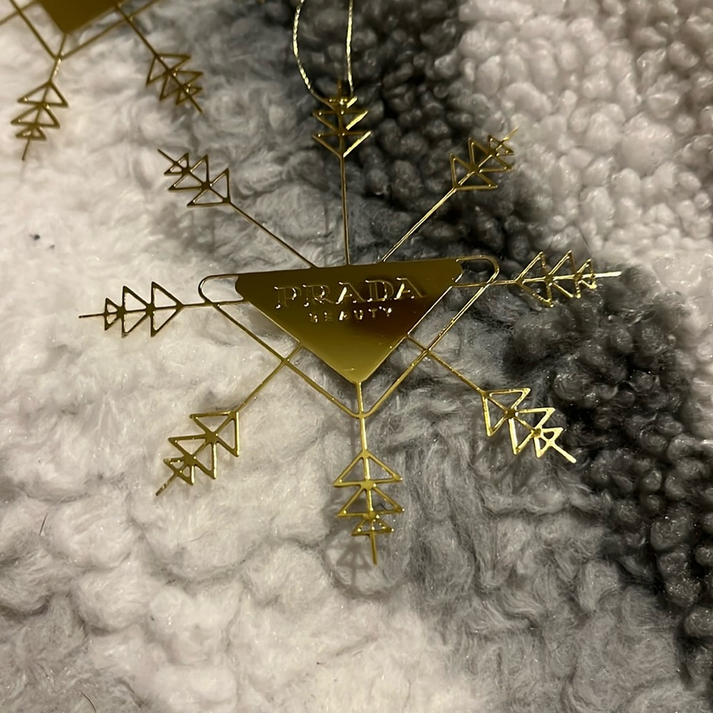 Christmas ornaments acknowledging Prada comes with 2 ornaments